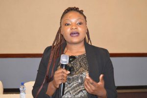 Malawi Electoral Commission (MEC) Press Officer Chikondi Mvula making her remarks after receiving the Golden Key Award